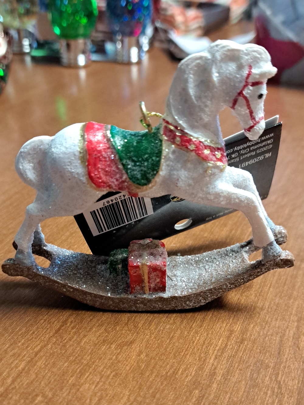 Sparkling White Rocking Horse Ornament with Red & Green Accents